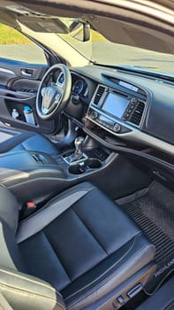 Ottawa, ON Canada - 09.09.2023: Vehicle Interior View Comfortable Toyota Highlander Car Seats and Modern Dashboard Design of Automobile.
