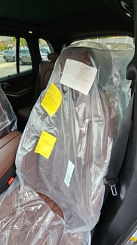 Ottawa, ON Canada - 09.27.2023: New Car Interior with Seat Protection Covers for Delivery, Ensuring Pristine Condition.