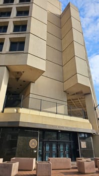 Washington D.C. USA - 12.29.2023: Government J. Edgar Hoover FBI Building Facade in Washington, D.C. with Architectural Details.