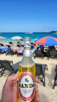 Nassau, Bahamas - 02.14.2024: Refreshing Beverage on Tropical Beach. Paradise Getaway. Vacation Relaxation Sunny Day