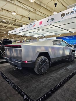 Toronto, ON Canada - 02.23.2024: Cyber Truck Futuristic Vehicle on Display Angular Design and Modern Styling for Automotive Enthusiasts.