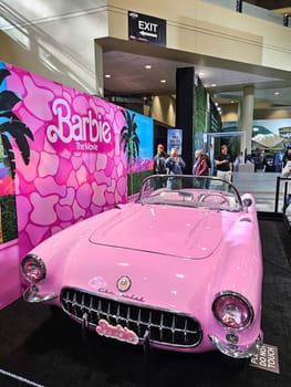 Toronto, ON Canada - 02.23.2024: Classic Pink Barbie Convertible Car Display, A Stylish Nod to Retro Automotive Design.