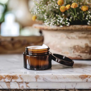 Cosmetic cream in a glass jar. Skin care concept. Background for beauty products