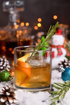 Bourbon Old Fashioned Winter Cocktail. Spicy rosemary syrup mixed with warming bourbon, fresh lemon and orange