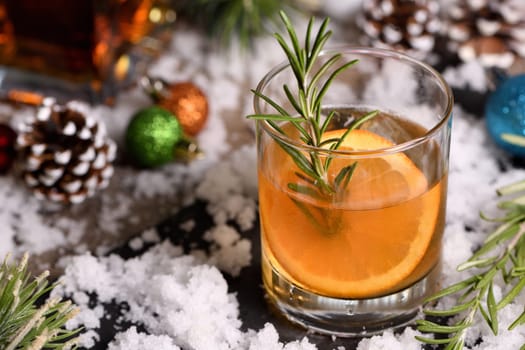 Bourbon Old Fashioned Winter Cocktail. Spicy rosemary syrup mixed with warming bourbon, fresh lemon and orange