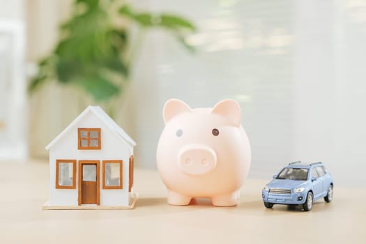 House and car models next to piggy bank signify saving for property and automobile ownership. Emphasizes investment strategies, financial planning, tax minimization for asset building expense control