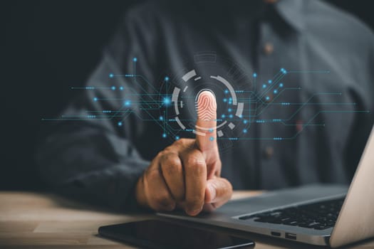Securing your digital world with biometric identification and fingerprint scanning. Futuristic technology on screen providing access control and data privacy. Unlock future of information security.