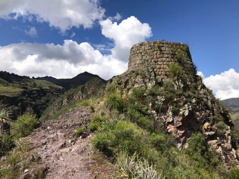 Puka pukara ruins sit on a hilltop overlooking cusco valley in peru, serving as a military outpost during inca empire