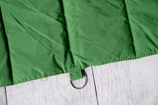 Waterproof and foldable pet friendly mat lying on a wooden floor
