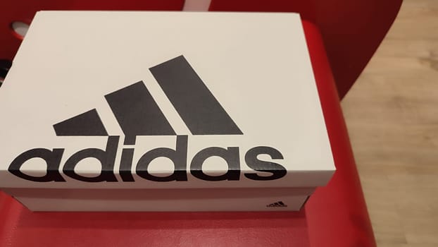 October 22 2024 Hradec Kralove, Czech Republic Europe, Kralov region, Kralovehradecky kraj, Adidas shoe box objects floor design sign brand shop shopping collection company commercial business editorial . High quality photo