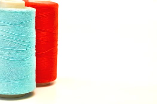 a cylindrical device on which film, magnetic tape, thread, or other flexible materials can be wound a reel.