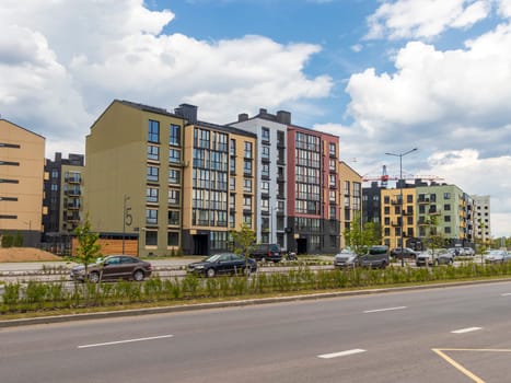 Shot of the stylish, modern, urban, residential suburb where buildings have ergonomic design and vivid colors