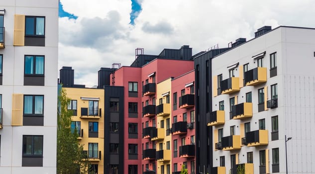 Shot of the stylish, modern, urban, residential suburb where buildings have ergonomic design and vivid colors