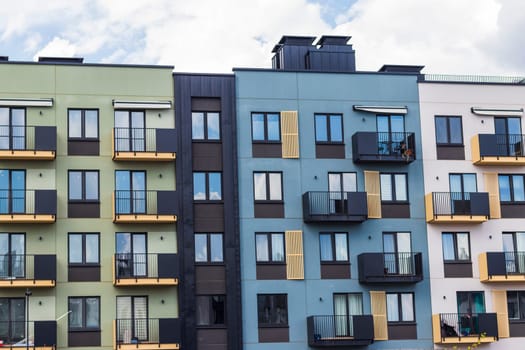 Shot of the stylish, modern, urban, residential suburb where buildings have ergonomic design and vivid colors