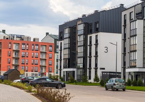 Shot of the stylish, modern, urban, residential suburb where buildings have ergonomic design and vivid colors