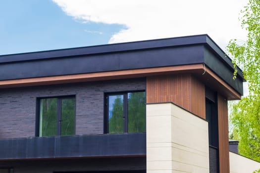 Facade of the stylish, urban, modern house, ergonomically designed and made of ecological materials