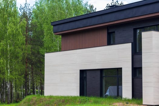 Facade of the stylish, urban, modern house, ergonomically designed and made of ecological materials