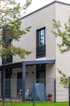 Facade of the stylish, urban, modern house, ergonomically designed and made of ecological materials