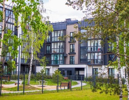 Shot of the stylish, modern, urban, residential suburb where buildings have ergonomic design and vivid colors