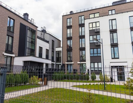 Shot of the stylish, modern, urban, residential suburb where buildings have ergonomic design and vivid colors