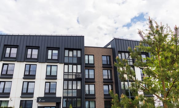 Shot of the stylish, modern, urban, residential suburb where buildings have ergonomic design and vivid colors