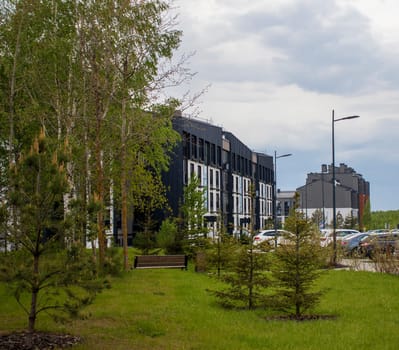Shot of the stylish, modern, urban, residential suburb where buildings have ergonomic design and vivid colors