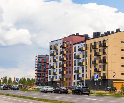 05.05.2025 - Minsk, Belarus. Shot of the stylish, modern, urban, residential suburb called Zelenaya gavan or Green Bay, where buildings have ergonomic design and vivid colors