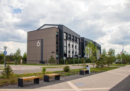 Shot of the stylish, modern, urban, residential suburb where buildings have ergonomic design and vivid colors