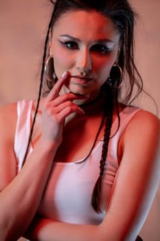 A striking portrait of a confident woman with beautifully braided hair and a stylish outfit that stands out