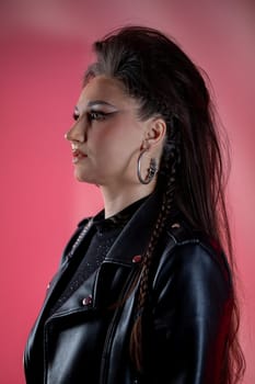 A striking profile shot that showcases edgy fashion combined with a vibrant and colorful backdrop setting