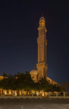 UAE, Dubai, 23 September 2024: Illuminated Jumeirah mosque Masjid Rawda Al Abrar Mosque at dusk, It is also an educational center for cultural understanding. Muslim religion concept. High quality photo