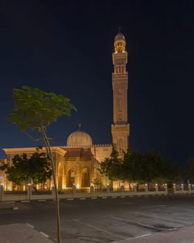 UAE, Dubai, 23 September 2024: Illuminated Jumeirah mosque Masjid Rawda Al Abrar Mosque at dusk, It is also an educational center for cultural understanding. Muslim religion concept. High quality photo