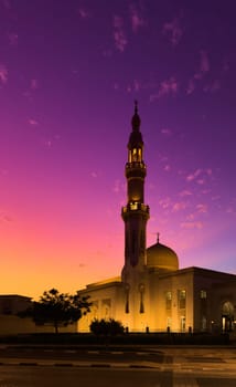 UAE, Dubai, 23 September 2024: Illuminated Jumeirah mosque Masjid Rawda Al Abrar Mosque at dusk, It is also an educational center for cultural understanding. Muslim religion concept. High quality photo