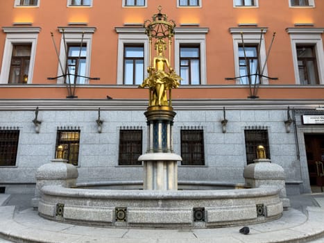Moscow, Russia, April 26, 2025: Bronze and gold sculpture of Princess Turandot fountain located near the Vakhtangov State Academic Theater on Arbat Street in central Moscow
