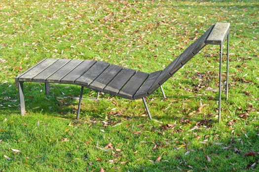 sunbed, wood chaise longue in the park