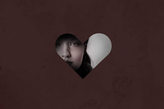 A person with an intriguing expression peeks through a heart-shaped opening, creating an atmosphere of mystery and introspection. The setting evokes a mix of emotions.