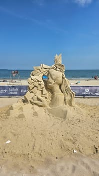 Boston, MA USA - 08.05.2024: Intricate Sand Sculpture of a Woman on the Beach, a Testament to Artistic Creativity.
