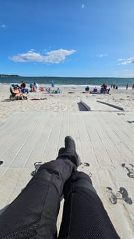 Sargents Purchase, NH USA - 08.22.2024: Relaxing Beach Scenery Motorcyclist s Perspective on a Sunny Day with Blue Skies and Ocean View.