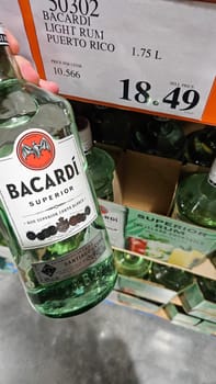 Sarasota, FL USA - 12.26.2024: Refreshing Clear Spirit Bottle with Label Close-Up, Ready for Party and Celebration.