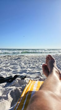 Experience a peaceful beach vacation with warm sun, soft sand, and gentle waves. This scene captures relaxation and tranquility, perfect for travel and leisure themes.
