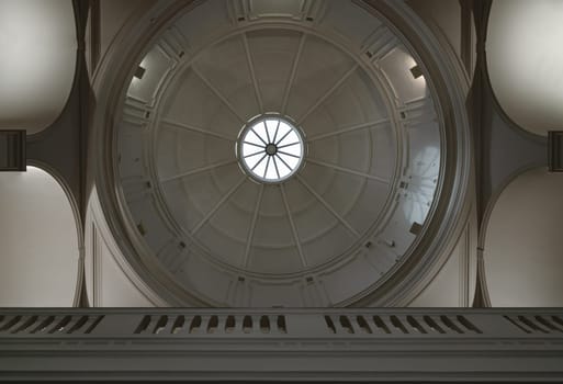 London, UK - May 07, 2025 - Upward View of round ceiling with glass dome skylight inside Hallway of The V&A (Victoria and Albert Museum) in London. use it as your Wallpaper, Poster and Space for text, Selective focus.