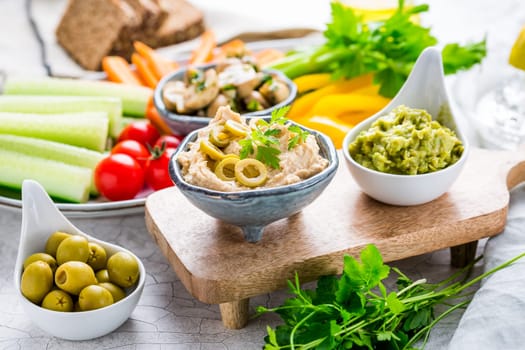 Summer crudites platter with hummus and avocado dip