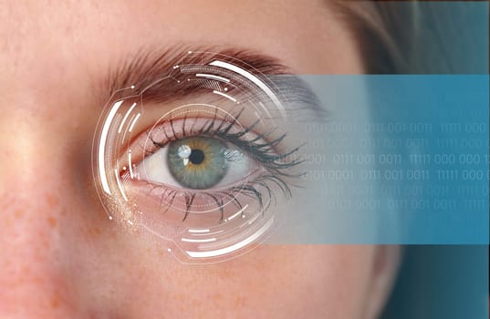 A close-up view of a human eye integrated with digital elements. The eye features data patterns and futuristic designs, highlighting advancements in technology.