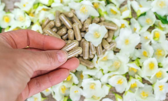Jasmine essential oil and flowers. Selective focus. nature.