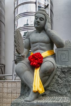 Kuala Lumpur, Malaysia - Feb. 19, 2025: Statue no.19 of the 24 Filial Exemplars collection at Thean Hou Temple, depicts Wu Meng, who let mosquitoes bite him to satisfy his parents