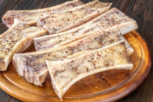 Halved bones baked to golden perfection, textures glisten with flavorful meaty depth