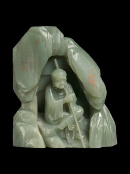 18th-century Chinese carving of a seated Luohan (Arhat) within a grotto, rendered in pale green jade. Intricate details, spiritual representation.