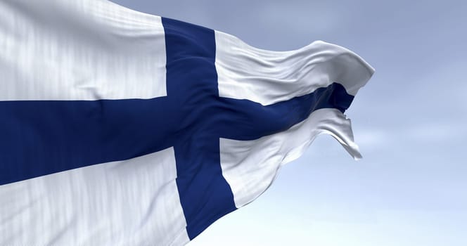 Close-up of national flag of Finland waving in the wind. Blue Nordic cross on white background. Scandinavian country. 3D illustration render. Rippled textile background.