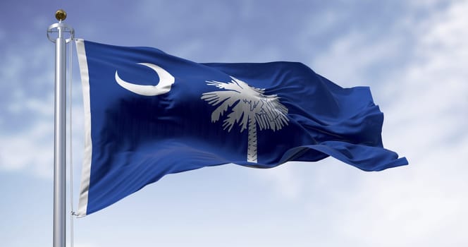South Carolina state flag waving in the wind. Blue field with white palmetto tree and crescent. US state. Rippled fabric. 3d illustration render. Rippling fabric