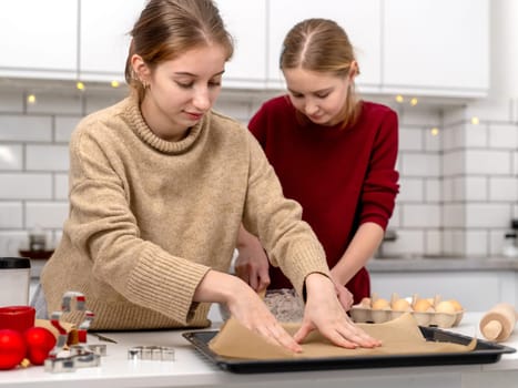 Sister's Kids Making Gingerbread At Home In The Kitchen